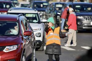 Turkeys flying Saturday morning during 1,000 bird giveaway in Watertown