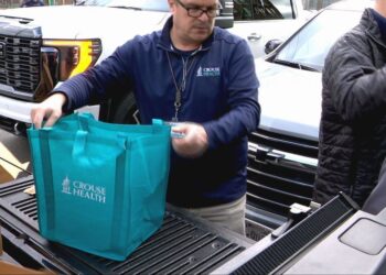 Crouse Health delivers Thanksgiving meals to Syracuse schools