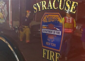 Vacant building catches fire and partially collapses on Delaware St